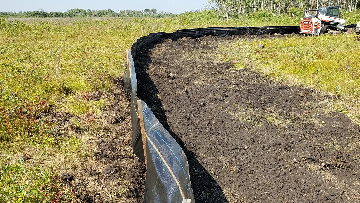 Silt fencing was installed around the project site to prevent animals from entering
