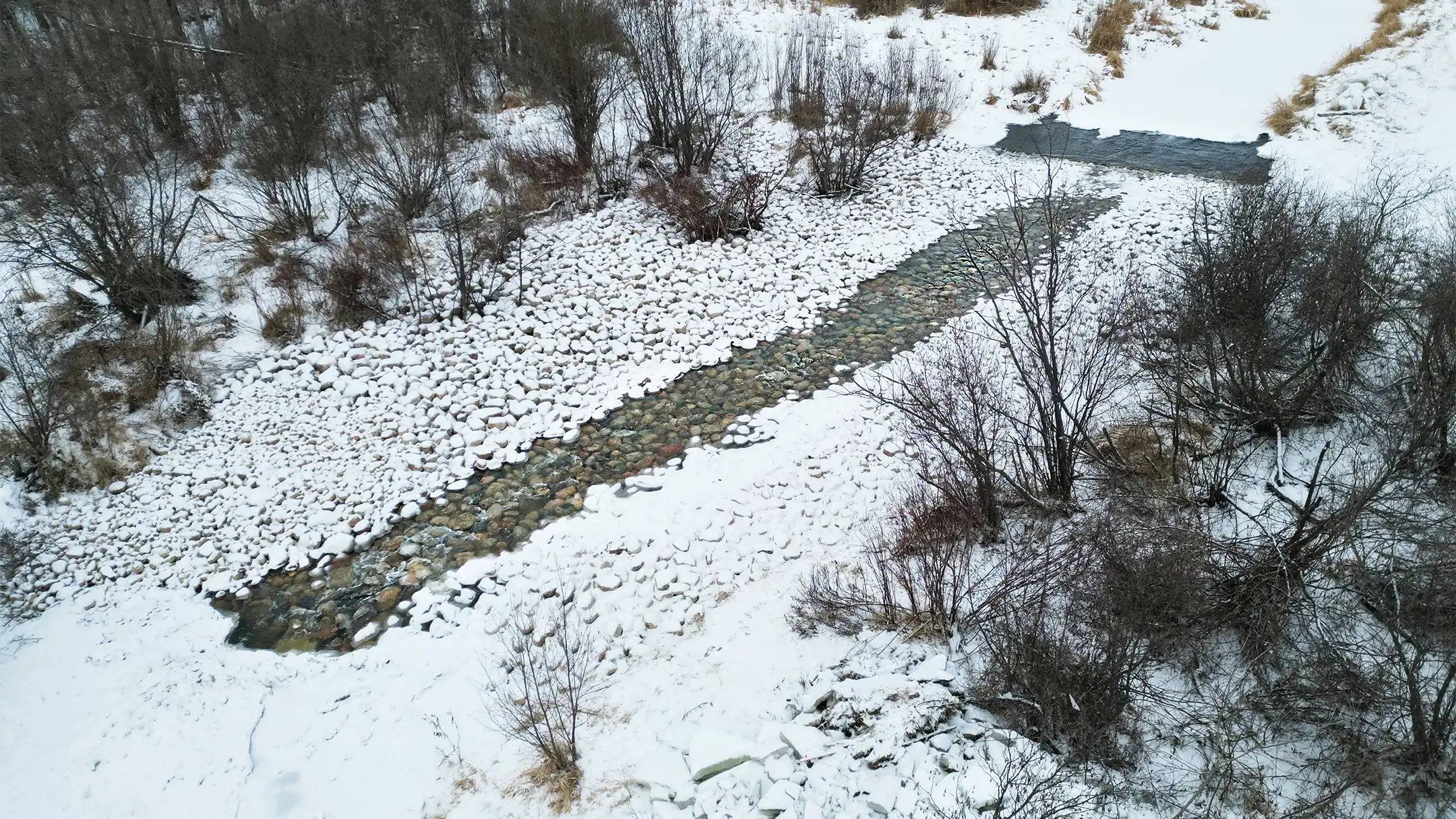 A full, aerial view of the rock ramp