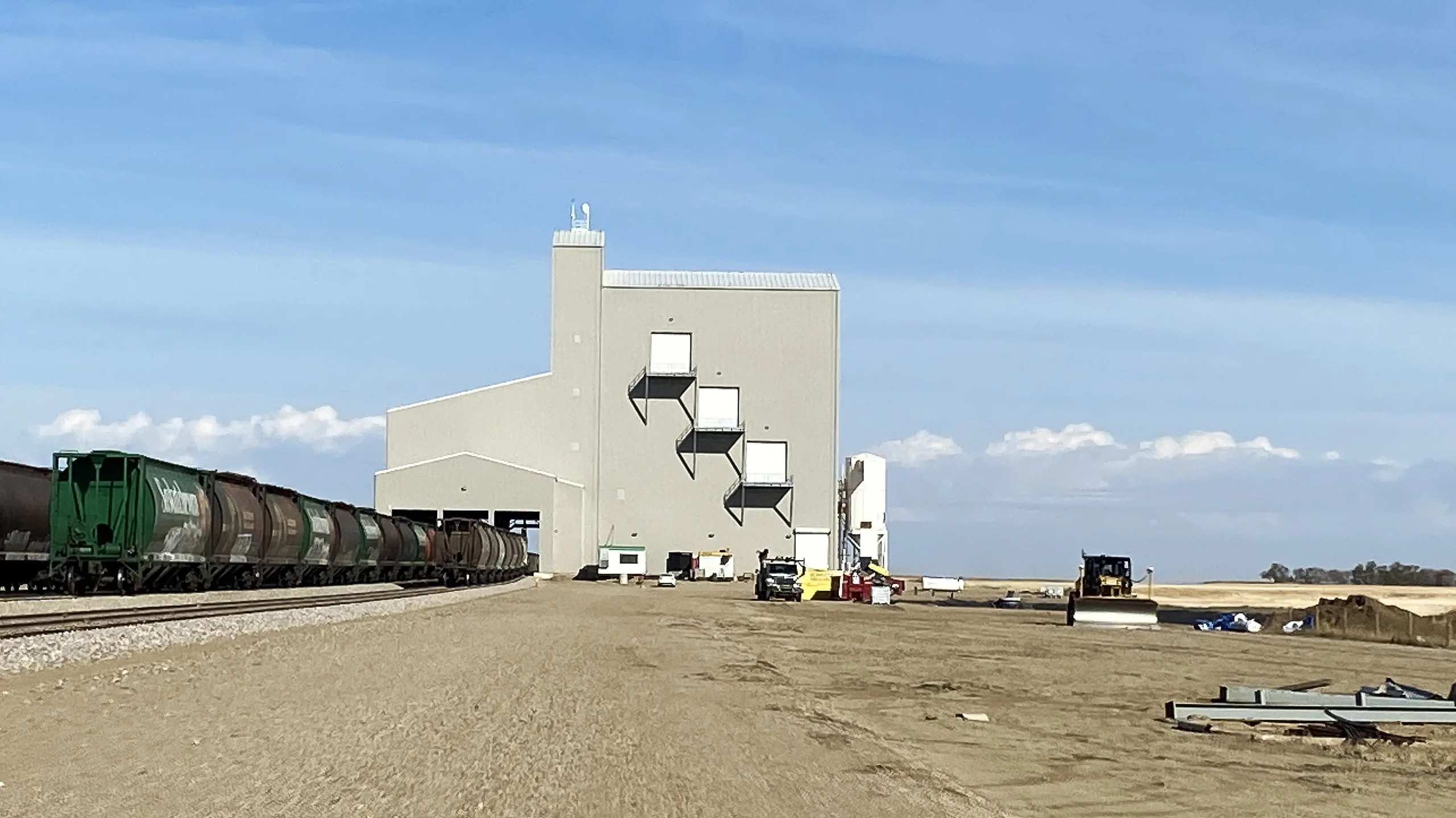 Side view of finished structure with train entering loadout station