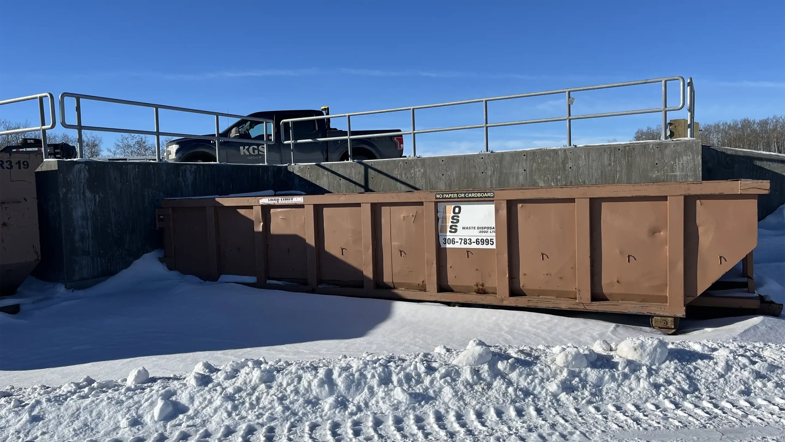 The completed roll-off bin system