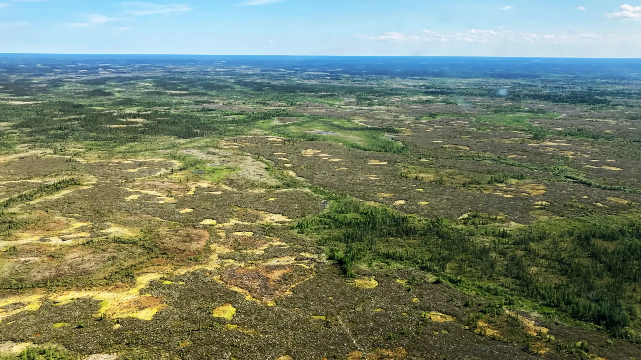 Ariel view of widespread permafrost melt along Nelson river
