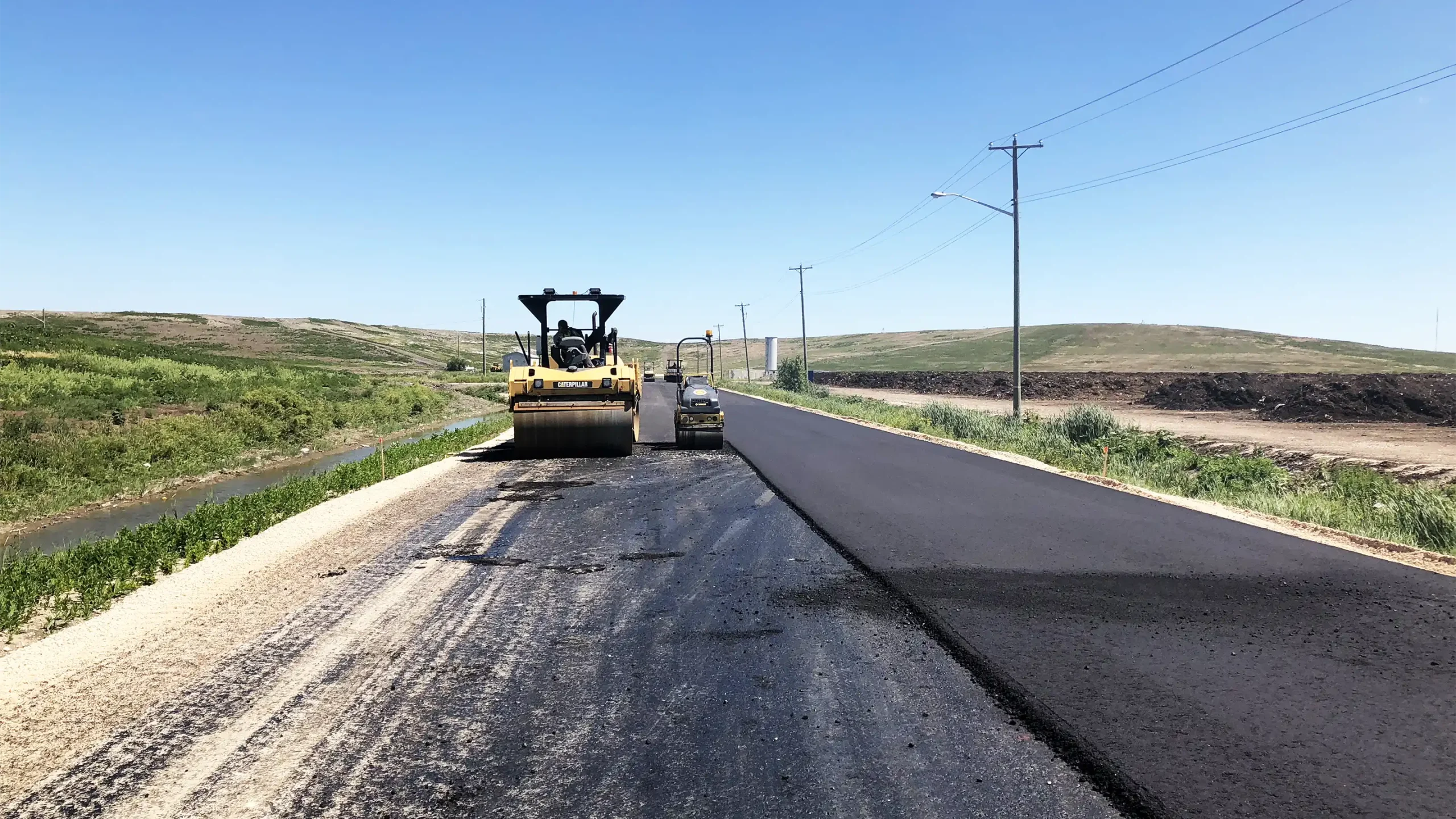 Machinery laying asphalt