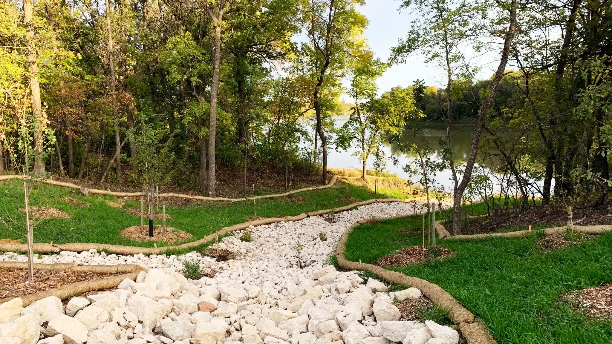 Revegetated riverbank area and complete culvert