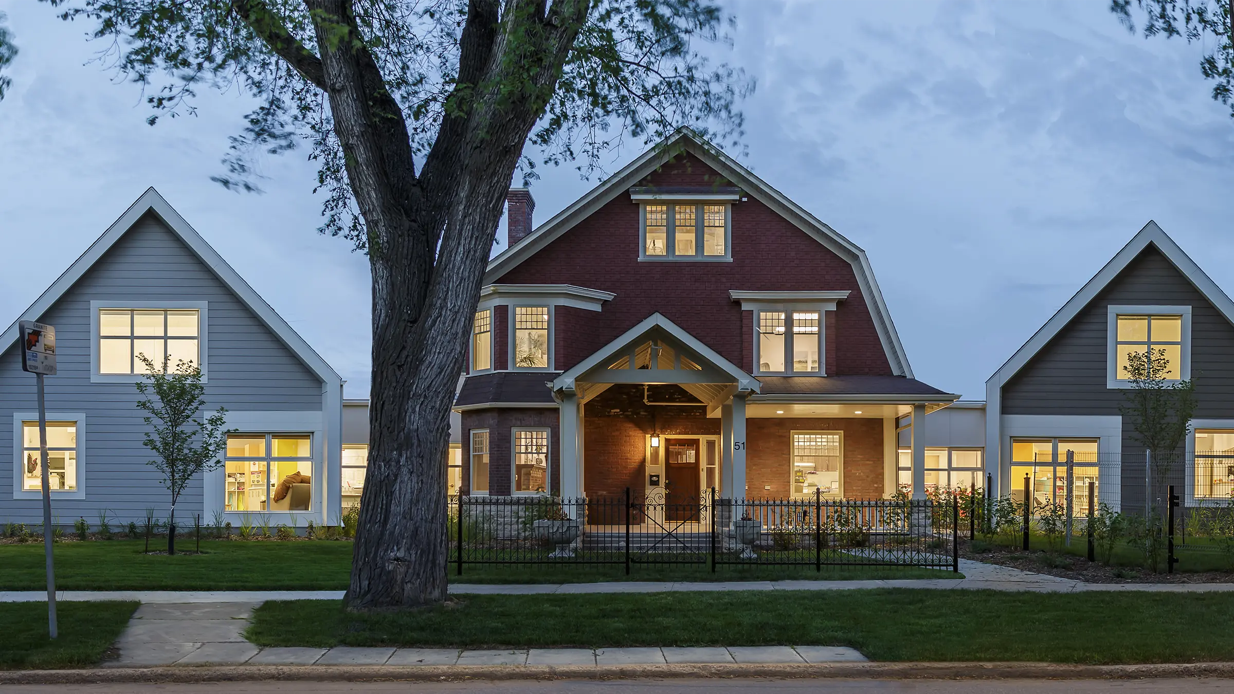Street view of Milner House and adjacent new buildings.