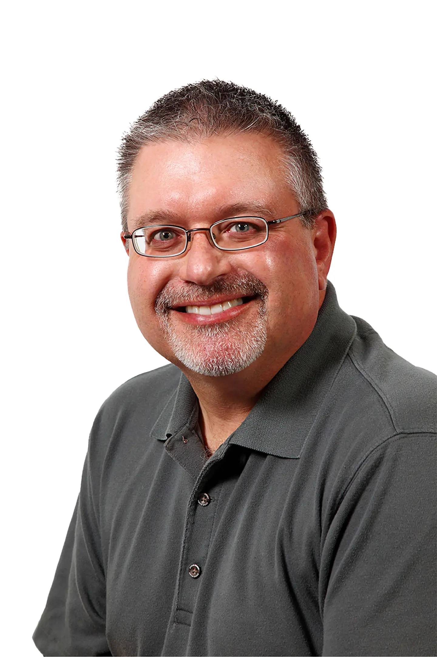 Professional headshot of a person smiling at the camera against a white background.