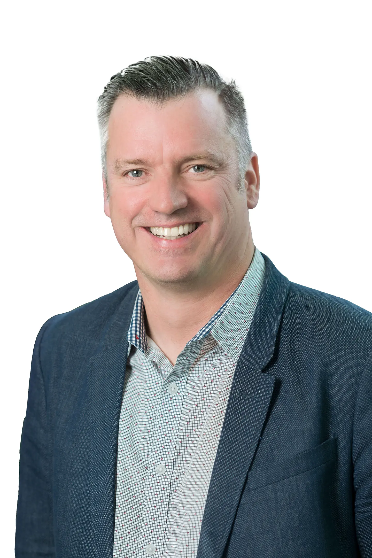 Professional headshot of a person smiling at the camera against a white background.